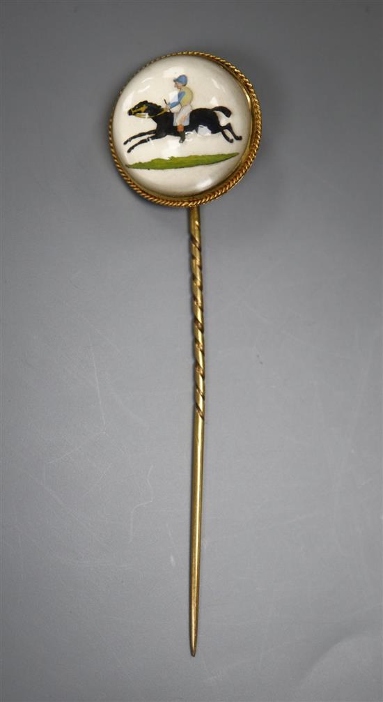 A Victorian yellow metal and Essex crystal, Hong Kong Races, 1881 stick pin, decorated with horse & jockey, 77m, gross 7.1 grams.